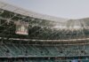 В «Белл-центре» состоится просмотр седьмого матча «Канадиенс» A spacious, modern sports stadium in Kocaeli, Türkiye, illuminated during sunset.