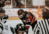 «Оттава Сенаторз» едут в Нью-Джерси за пятой победой подряд Close-up action scene of ice hockey players in full gear competing on an indoor rink.