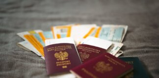Close-up of Polish passports and travel tickets symbolizing travel and adventure.