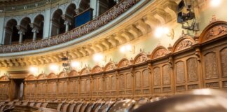 Interior view of the elegant Swiss Parliament council chamber in Bern, Switzerland.
