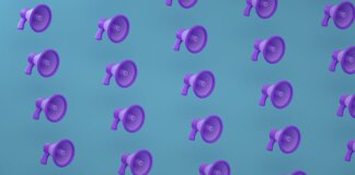 Bright purple megaphones pattern on a blue backdrop creating an abstract and modern visual.