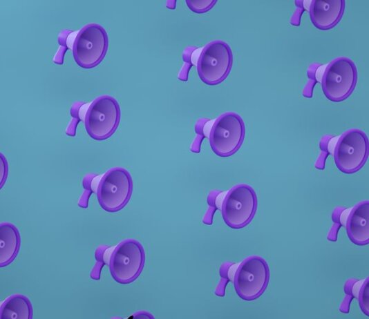 Bright purple megaphones pattern on a blue backdrop creating an abstract and modern visual.