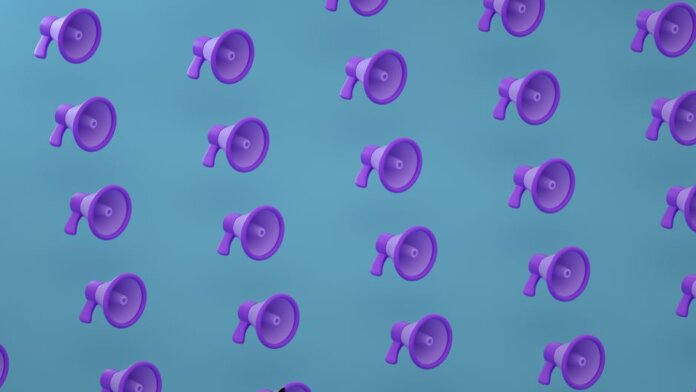 Bright purple megaphones pattern on a blue backdrop creating an abstract and modern visual.