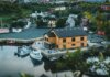 Рыбная индустрия Ньюфаундленда превысила $2 млрд по рыночной стоимости Charming aerial view of Quidi Vidi village and harbor with boats and colorful houses in St. John's, Newfoundland.