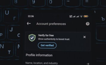 Close-up of a smartphone screen displaying account verification alert. Ideal for security and authenticity themes.