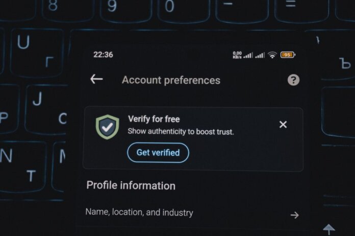 Close-up of a smartphone screen displaying account verification alert. Ideal for security and authenticity themes. Close-up of a smartphone screen displaying account verification alert. Ideal for security and authenticity themes.