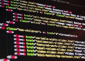 Meta AI теперь не только думает, но и действует за пользователя Close-up of HTML code highlighted in vibrant colors on a computer monitor.
