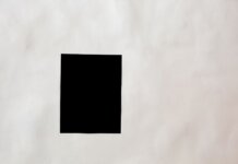 Канада стала наблюдателем в программе GCAP по разработке истребителей Creative black mock up rectangular paper sheet with copy space attached on white wall in light room of modern studio