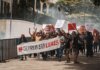 Demonstrators holding banners and signs during a peaceful protest in San José, Costa Rica.