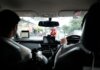 Experience a typical taxi ride through the streets of Bangkok, Thailand.