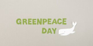 Minimalist paper cutout design for Greenpeace Day with whale illustration on copy space background.