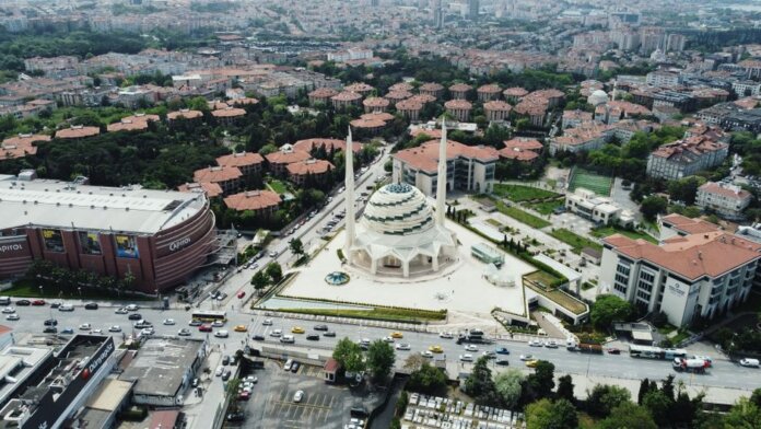 Stunning aerial view of a modern mosque in Istanbul, showcasing surrounding cityscape. Stunning aerial view of a modern mosque in Istanbul, showcasing surrounding cityscape.