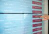 Министры здравоохранения выступят по борьбе с опиоидным кризисом A hand interacts with a digital touchscreen interface showing availability and update options.