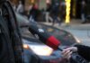 CBC отказалась называть теракты 11 сентября терактами A person being interviewed on a Vancouver street, holding a microphone.