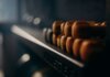 CBSA изъяла 300 кг метамфетамина в контейнере, отправленном на Филиппины A rack of dumbbells in a dimly lit gym, highlighting fitness equipment.