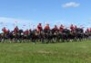 Королевский военно-морской флот Канады получил нового командующего Canadian Mounties in red uniforms riding horses at an outdoor event.