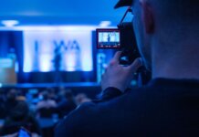 Capturing a conference event with a focus on professional videography services.