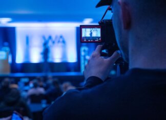 Capturing a conference event with a focus on professional videography services.