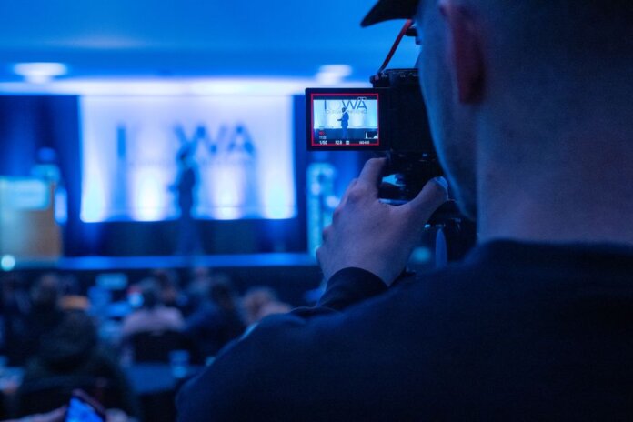 Capturing a conference event with a focus on professional videography services. Capturing a conference event with a focus on professional videography services.