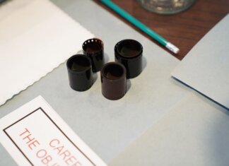 Close-up of film negatives and tools used in vintage photography development.