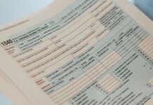 Detailed close-up image of a U.S. 1040 Individual Income Tax Return form, ideal for finance-related content.