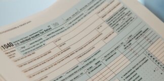 Detailed close-up image of a U.S. 1040 Individual Income Tax Return form, ideal for finance-related content.