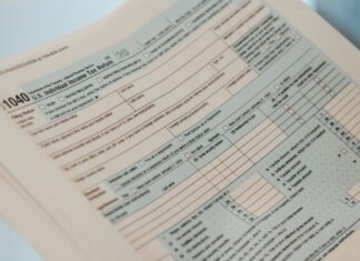 Detailed close-up image of a U.S. 1040 Individual Income Tax Return form, ideal for finance-related content.