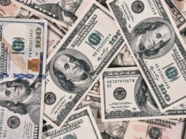 Detailed close-up of US dollar bills highlighting wealth and finance concepts.
