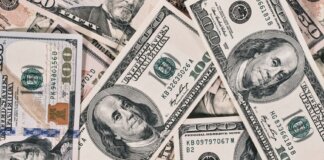 Detailed close-up of US dollar bills highlighting wealth and finance concepts.