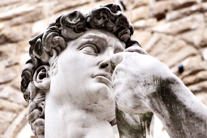 Detailed view of Michelangelo's David sculpture in Florence, Italy. Detailed view of Michelangelo's David sculpture in Florence, Italy.