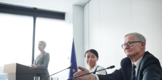 Panelists at an EU conference discussing law and diplomacy.