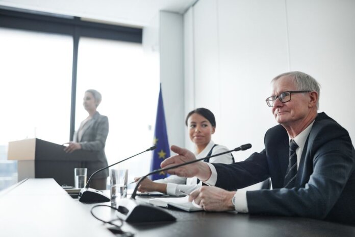Panelists at an EU conference discussing law and diplomacy. Panelists at an EU conference discussing law and diplomacy.