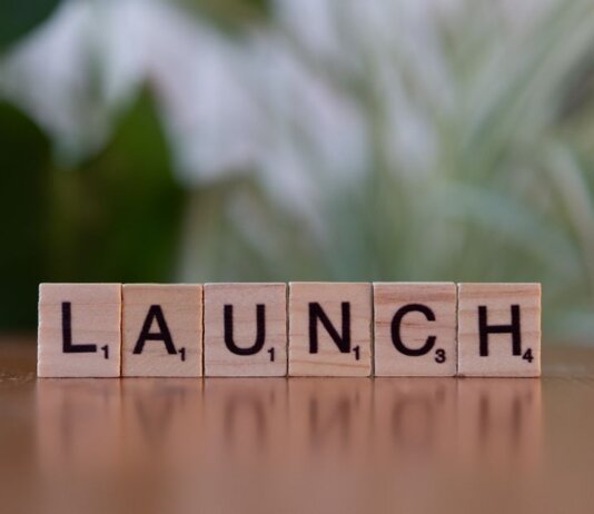 Scrabble tiles spelling 'launch' reflecting entrepreneurship and innovation.