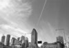 Сезон «Монреаль Канадиенс» 2025–26: год для истории Stunning black and white view of Montreal's skyline featuring tall skyscrapers and dynamic clouds.