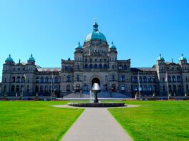 Stunning view of the British Columbia Parliament Building with clear blue sky.