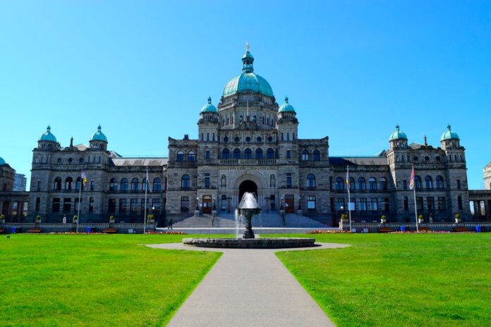 Stunning view of the British Columbia Parliament Building with clear blue sky. Stunning view of the British Columbia Parliament Building with clear blue sky.