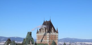 The iconic Château Frontenac covered in snow in Québec City, Canada.
