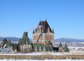 The iconic Château Frontenac covered in snow in Québec City, Canada.