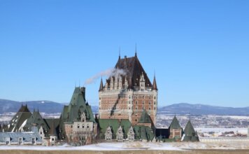 The iconic Château Frontenac covered in snow in Québec City, Canada.