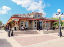 A sunny day at the historic Calgary Railway Cafe, showcasing classic architecture.