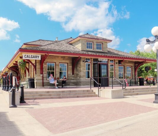 A sunny day at the historic Calgary Railway Cafe, showcasing classic architecture.