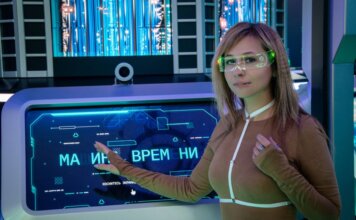 Умные очки Meta Ray-Ban Display поступили в продажу в Канаде: что нового A woman interacts with a futuristic touchscreen display in a technology-themed environment.