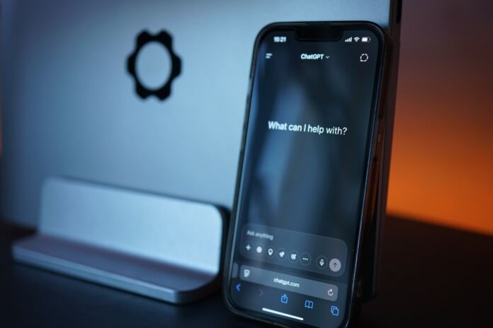 Close-up of a smartphone with AI chat interface, showcasing advanced technology in a sleek design. Close-up of a smartphone with AI chat interface, showcasing advanced technology in a sleek design.