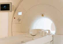 Close-up view of a modern CT scanner in a healthcare facility.