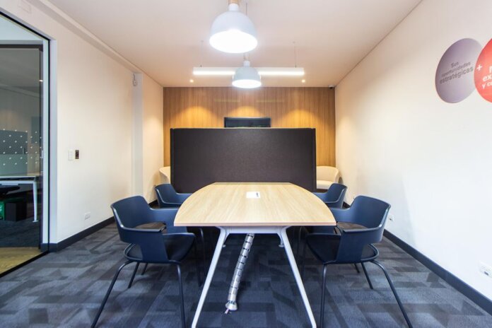 Contemporary conference room with stylish furniture and lighting, ideal for meetings. Contemporary conference room with stylish furniture and lighting, ideal for meetings.