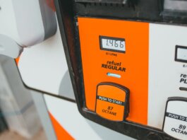 Detailed view of a gas pump showing price and octane level 87.