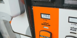 Detailed view of a gas pump showing price and octane level 87.
