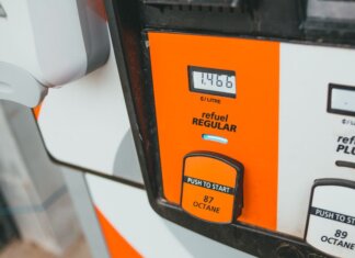 Detailed view of a gas pump showing price and octane level 87.