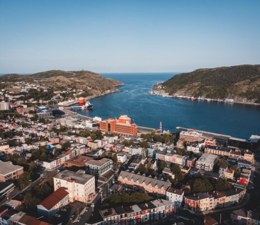 Elevated view of St. John's vibrant cityscape and picturesque harbor.