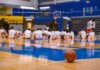 Group of teens at a basketball training session on an indoor court in Victoria, BC.